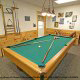 Game room with pool table in cabin 258 (Sweet Memories) at Eagles Ridge Resort at Pigeon Forge, Tennessee.