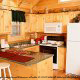 Fully furnished kitchen in cabin 259 (Country Charm) , in Pigeon Forge, Tennessee.