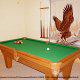 Game room with pool table in cabin 259 (Country Charm) , in Pigeon Forge, Tennessee.