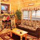 Living Room View of Cabin 262 (Tucked Away) at Eagles Ridge Resort at Pigeon Forge, Tennessee.