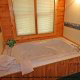 Private jacuzzi in Cabin 27, (Bear Naked), in Pigeon Forge, Tennessee.