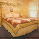Country bedroom in cabin 298 (Renewed Spirit) at Eagles Ridge Resort at Pigeon Forge, Tennessee.