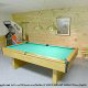 Game room with pool table in cabin 298 (Renewed Spirit) at Eagles Ridge Resort at Pigeon Forge, Tennessee.