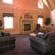 Great room with fireplace in cabin 298 (Renewed Spirit) at Eagles Ridge Resort at Pigeon Forge, Tennessee.
