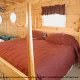 Bedroom with King Size Bed in Cabin 3 (Best Of Both Worlds) at Eagles Ridge Resort at Pigeon Forge, Tennessee.