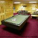 Game room with pool table in cabin 304 (Southern Hospitality) at Eagles Ridge Resort at Pigeon Forge, Tennessee.