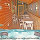 Deck with hot tub in cabin 305 (Bear Right In) at Eagles Ridge Resort at Pigeon Forge, Tennessee.