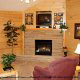Living room with fire place in cabin 306 (A Smoky Mountain Dream) , in Pigeon Forge, Tennessee.