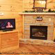 Great room with fire place in cabin 307 (Eagles View) , in Pigeon Forge, Tennessee.