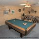 Game room with Pool Table in cabin 308 (The Cozy Bear ) , in Pigeon Forge, Tennessee.