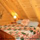 Country bedroom in cabin 309 (Georges) at Eagles Ridge Resort at Pigeon Forge, Tennessee.