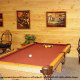 Game room with pool table in cabin 309 (Georges) at Eagles Ridge Resort at Pigeon Forge, Tennessee.