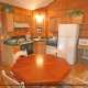 Country furnished kitchen in cabin 31 (Grandma And Grandpas Place), in Pigeon Forge, Tennessee.