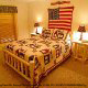 Country bedroom in cabin 310 (Country Bear Cove ) , in Pigeon Forge, Tennessee.