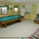 Game room with pool table in cabin 310 (Country Bear Cove ) , in Pigeon Forge, Tennessee.