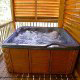 Outside hot tub on porch in cabin 310 (Country Bear Cove ) , in Pigeon Forge, Tennessee.