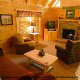 Living room with fire place in cabin 310 (Country Bear Cove ) , in Pigeon Forge, Tennessee.