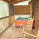 Outside deck with hot tub in cabin 311 (Chanticleer) , in Pigeon Forge, Tennessee.