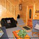 Country den in cabin 312 (Bear Mountain Memories) at Eagles Ridge Resort at Pigeon Forge, Tennessee.
