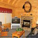 Living room with fireplace in cabin 312 (Bear Mountain Memories) at Eagles Ridge Resort at Pigeon Forge, Tennessee.