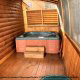 Deck with hot tub in cabin 313 (Crosswinds) at Eagles Ridge Resort at Pigeon Forge, Tennessee.