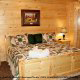 Country bedroom in cabin 316 (Black Bear Hideaway) , in Pigeon Forge, Tennessee.