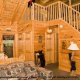 Den with Cozy Sofa - Cabin 317 (The Cubby Hole) at Eagles Ridge Resort at Pigeon Forge, Tennessee.