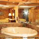 Private bedroom jacuzzi in cabin 32 (Country Delight), in Pigeon Forge, Tennessee.
