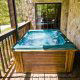 Spacious Hot Tub on Deck in Cabin 34 (Little Rocky Top) at Eagles Ridge Resort at Pigeon Forge, Tennessee.