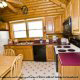 Fully Furnished Kitchen View of Cabin 34 (Little Rocky Top) at Eagles Ridge Resort at Pigeon Forge, Tennessee.