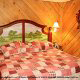Country Bedroom View of Cabin 35 (Beautiful Design) at Eagles Ridge Resort at Pigeon Forge, Tennessee.