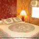 Bedroom with Queen Size Bed in Cabin 35 (Beautiful Design) at Eagles Ridge Resort at Pigeon Forge, Tennessee.