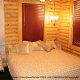 Bedroom with King Size Bed in Cabin 35 (Beautiful Design) at Eagles Ridge Resort at Pigeon Forge, Tennessee.