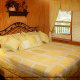 Bedroom with a view in cabin 38R (Country Romance), in Pigeon Forge, Tennessee.