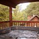 Relax in the hot tub and enjoy natural at the same time in cabin 38R (Country Romance), in Pigeon Forge, Tennessee.