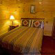 Pine furnished bedroom in cabin 40 (Bear Pause), in Pigeon Forge, Tennessee.