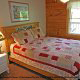 Country bedroom in cabin 41 (Tennessee Mountain Memories) , in Pigeon Forge, Tennessee.