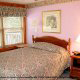 The perfect bedroom for your daughter to sleep in with its touch of pink in cabin 46 (Cherith Brook), in Pigeon Forge, Tennessee.