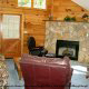 Curl up in this leather chair in front of the fire place in cabin 46 (Cherith Brook), in Pigeon Forge, Tennessee.