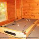 Game View with Pool Table of Cabin 48 (Bearly Wadin) at Eagles Ridge Resort at Pigeon Forge, Tennessee.