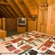 Bedroom View with TV Set of Cabin 49 (Dream View) at Eagles Ridge Resort at Pigeon Forge, Tennessee.