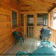 Feel the mountain breeze while enjoy nature on your back porch in cabin 50 (Creekside), in Pigeon Forge, Tennessee.