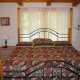 Enjoy this bedroom with its king size bed in cabin 54 (Mountain Majesty), in Pigeon Forge, Tennessee.