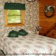 Country Bedroom View of Cabin 56 (Mountain High) at Eagles Ridge Resort at Pigeon Forge, Tennessee.