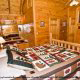 Bedroom View with Colorful Quilt of Cabin 57 (Bear Heaven) at Eagles Ridge Resort at Pigeon Forge, Tennessee.