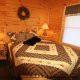 Country Bedroom View of Cabin 6 (On Eagles Wings) at Eagles Ridge Resort at Pigeon Forge, Tennessee.