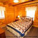Country Bedroom View of Cabin 64 (Heavenly Peace) at Eagles Ridge Resort at Pigeon Forge, Tennessee.