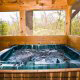 Hot Tub on Deck in Cabin 64 (Heavenly Peace) at Eagles Ridge Resort at Pigeon Forge, Tennessee.