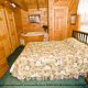 Bedroom with King Size Bed in Cabin 74 (Gerralds Chalet) at Eagles Ridge Resort at Pigeon Forge, Tennessee.