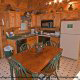 Fully furnished country kitchen in cabin 75 (Palmetto Place), in Pigeon Forge, Tennessee.